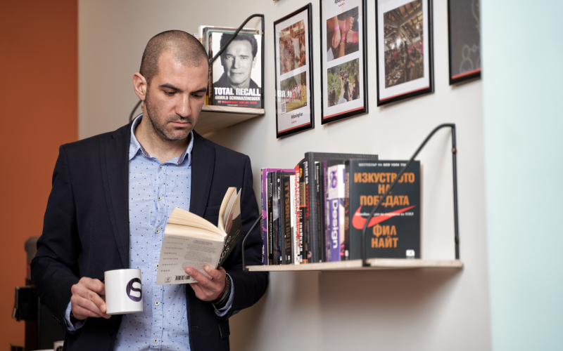 A business owner reading specialized literature on eCommerce.